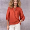 Ladder Trim Tie Neck Blouse